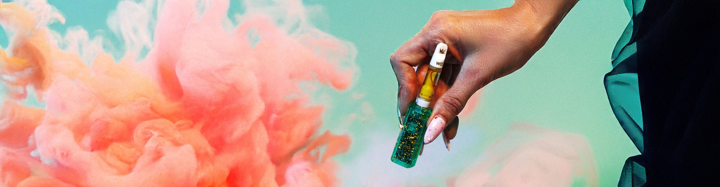 Wulf Mods UNI S oil Cartridge Vaporizer laying down outside on grass